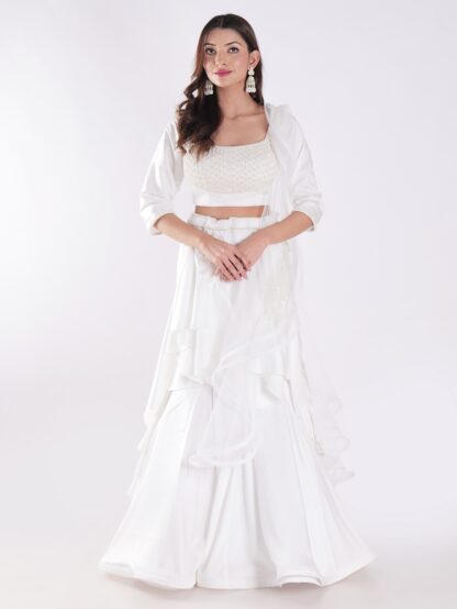White Flowing Intricate Layers Of Ruffles Dramatic And Elegant Silhouette Cocktail Lehenga Set