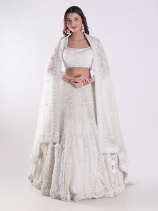Heavily Embellished With Sequins And Pearls Creating A White Shimmering Effect Bridal Lehenga Choli