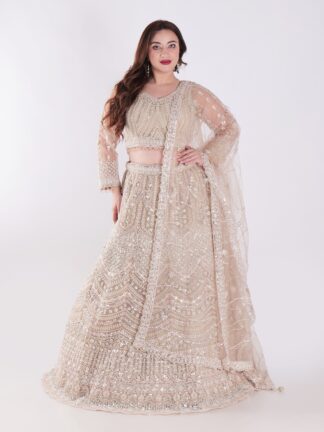 Intricately Designed Cream Colored Luxurious And Elegant Look Party Wear Lehenga Set