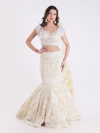 White And Cream Colored Heavily Embellished With A Sheer Dupatta Fish Cut Lehenga Set