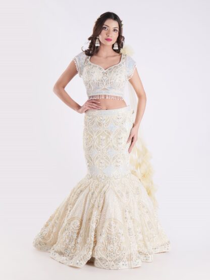 White And Cream Colored Heavily Embellished With A Sheer Dupatta Fish Cut Lehenga Set