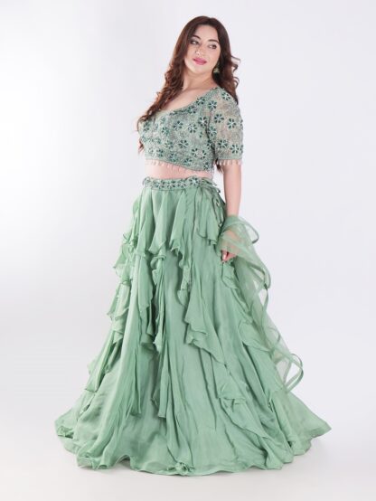 Sage Green With Intricate Silver And Emerald Green Embellishments Ruffled Lehenga Set