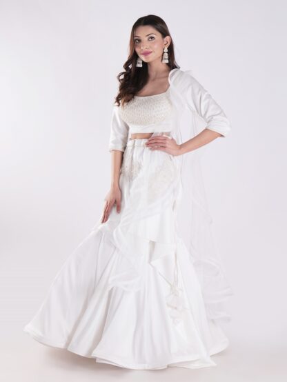 White Flowing Intricate Layers Of Ruffles Dramatic And Elegant Silhouette Cocktail Lehenga Set