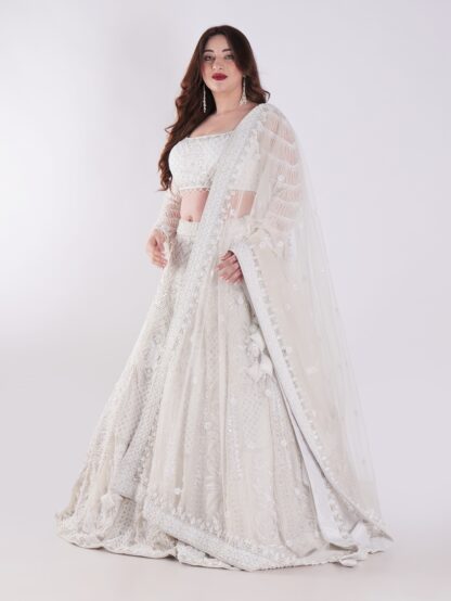 Delicate Floral Patterns And Sparkling Embellishments With Shimmering Effect Engagement Luxury Lehenga Set
