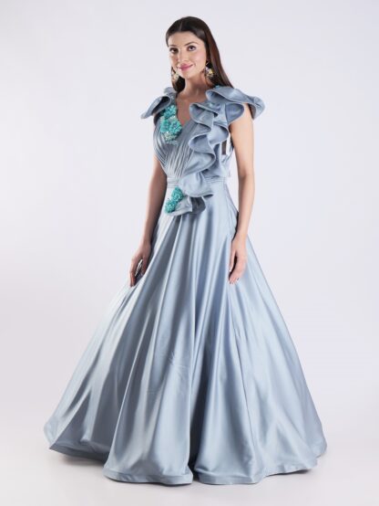 Elegant Sky Blue Designer Gown with Ruffle Detailing and Floral Embellishments