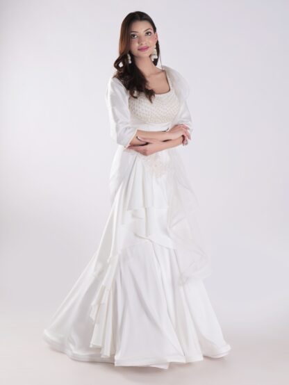 White Flowing Intricate Layers Of Ruffles Dramatic And Elegant Silhouette Cocktail Lehenga Set