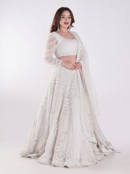 Delicate Floral Patterns And Sparkling Embellishments With Shimmering Effect Engagement Luxury Lehenga Set