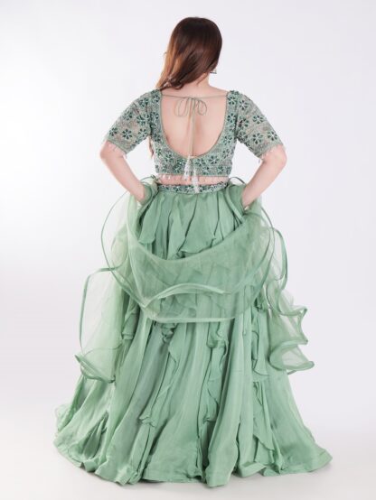 Sage Green With Intricate Silver And Emerald Green Embellishments Ruffled Lehenga Set