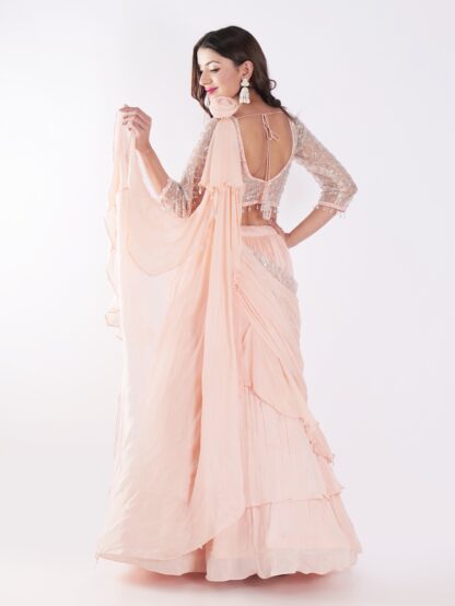 Beautiful Peach Colored Embroidered Crop Top Outfit Ruffle Drape Lehenga Set