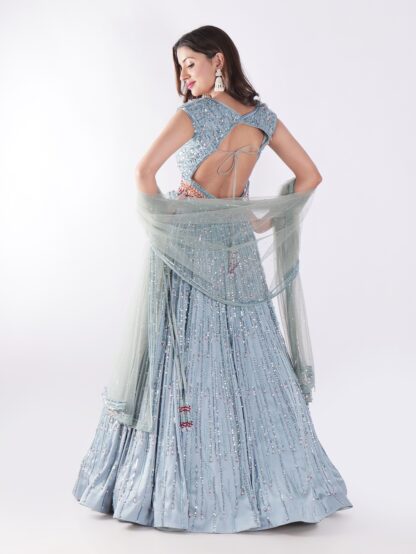 Stunning Blue And Silver Sequined Shimmering Effect Backless Party Wear Lehenga Set