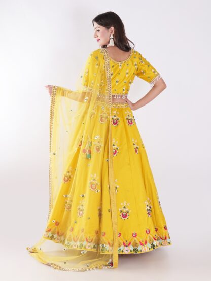 Vibrant Yellow Round Neckline And Short Sleeves Mehandi Designer Lehenga Set