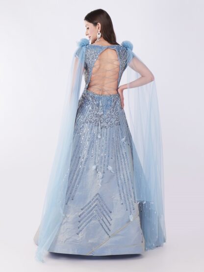 Radiate Royal Elegance In This Stunning Icy Blue Embroidered Gown with Cape Sleeves