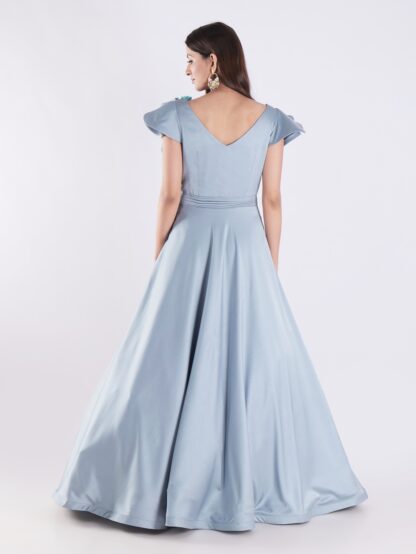 Elegant Sky Blue Designer Gown with Ruffle Detailing and Floral Embellishments