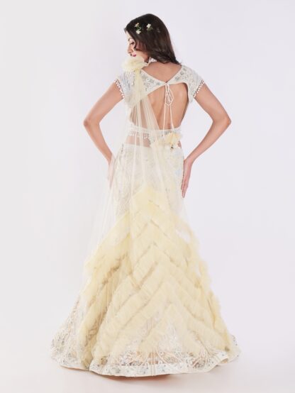 White And Cream Colored Heavily Embellished With A Sheer Dupatta Fish Cut Lehenga Set