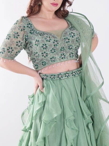 Sage Green With Intricate Silver And Emerald Green Embellishments Ruffled Lehenga Set