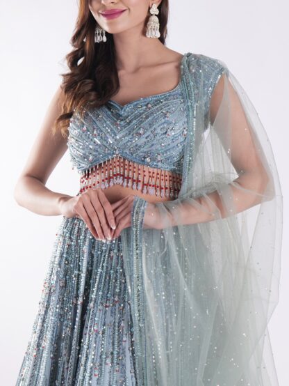 Stunning Blue And Silver Sequined Shimmering Effect Backless Party Wear Lehenga Set