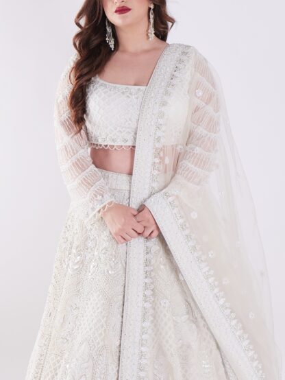 Delicate Floral Patterns And Sparkling Embellishments With Shimmering Effect Engagement Luxury Lehenga Set