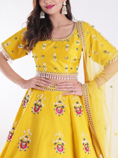 Vibrant Yellow Round Neckline And Short Sleeves Mehandi Designer Lehenga Set