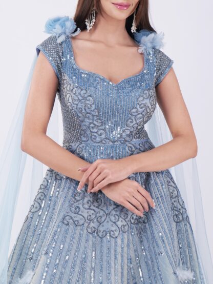 Radiate Royal Elegance In This Stunning Icy Blue Embroidered Gown with Cape Sleeves