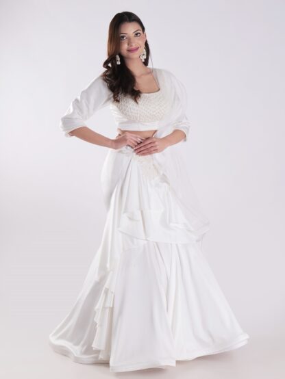 White Flowing Intricate Layers Of Ruffles Dramatic And Elegant Silhouette Cocktail Lehenga Set