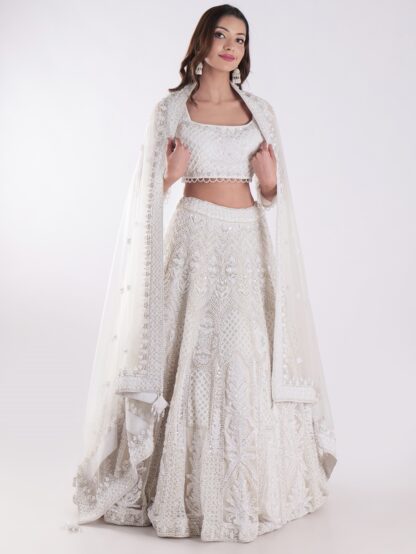 Heavily Embellished With Sequins And Pearls Creating A White Shimmering Effect Bridal Lehenga Choli