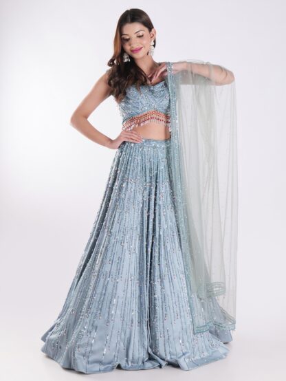 Stunning Blue And Silver Sequined Shimmering Effect Backless Party Wear Lehenga Set