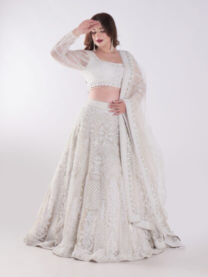 Delicate Floral Patterns And Sparkling Embellishments With Shimmering Effect Engagement Luxury Lehenga Set