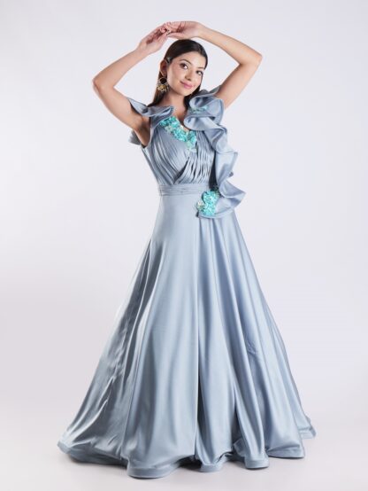 Elegant Sky Blue Designer Gown with Ruffle Detailing and Floral Embellishments
